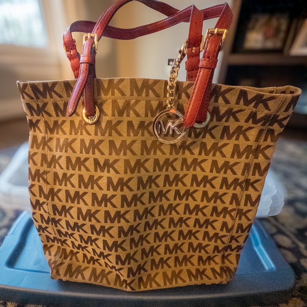 Michael Kors tote in brown with red accents